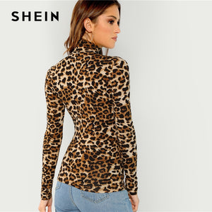 SHEIN Leopard Tee top Brand Name: SheIn Material: Polyester, SpandexItem Type: Tops Fabric Type: Broadcloth Style: BohemianPattern Type: Leopard Sleeve Length(cm): FullGender: Women Collar: StandFabric: Fabric has some stretch Material: 95% Polyester, 5% Spandex Style: Casual, High-street, Office Lady Decoration: Sheer, Contrast Mesh, Asymmetrical Pattern Type: Leopard Neckline: High Neck Size Details (cm)     Shoulder (cm) Bust (cm) Cuff (cm) Sleeve Length  (cm) Length(cm) XS 33 67 17 38
